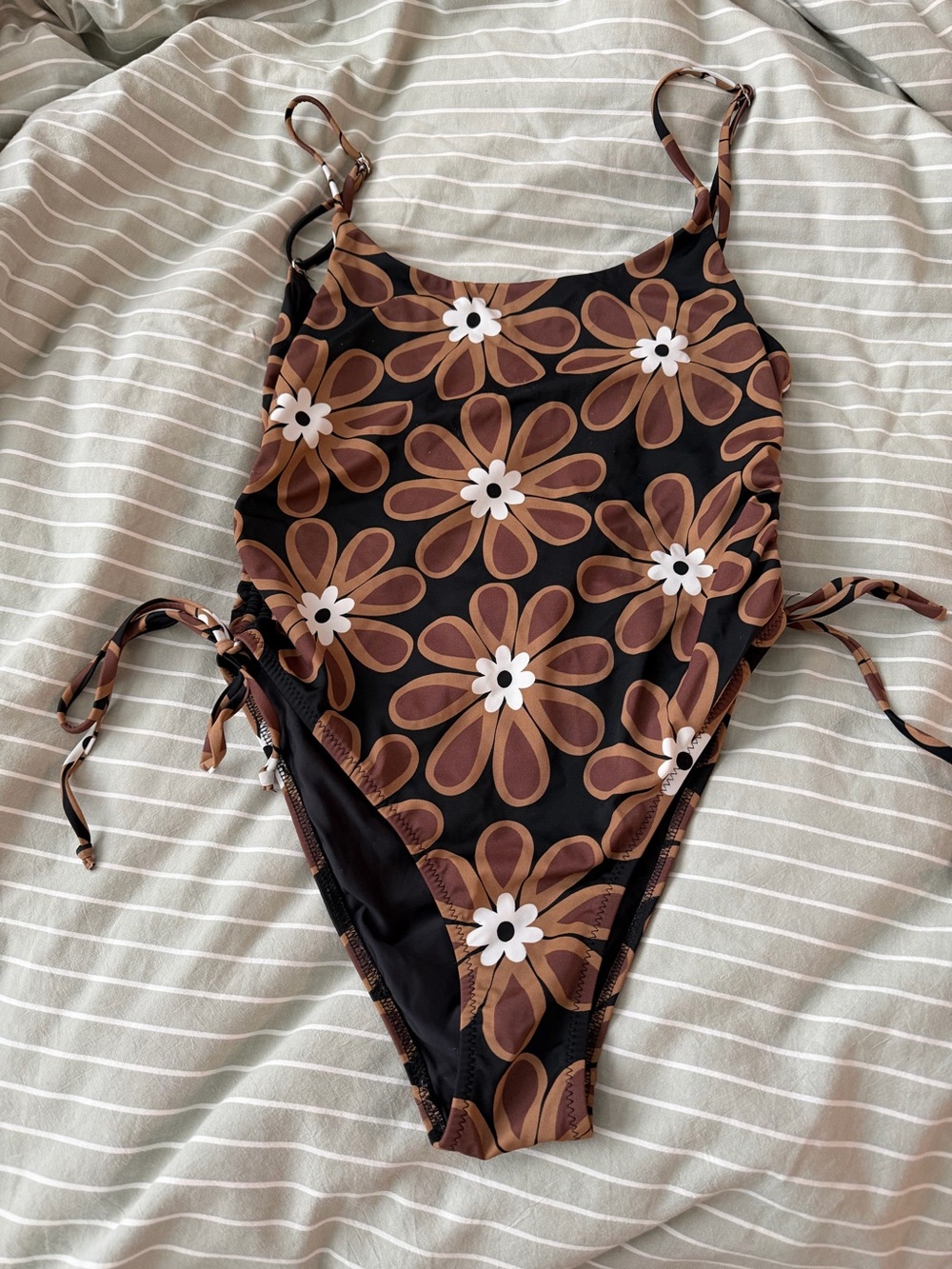 Elle swims one piece